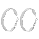 Two silver hoop earrings with a wave design, elegantly curved for a modern look.